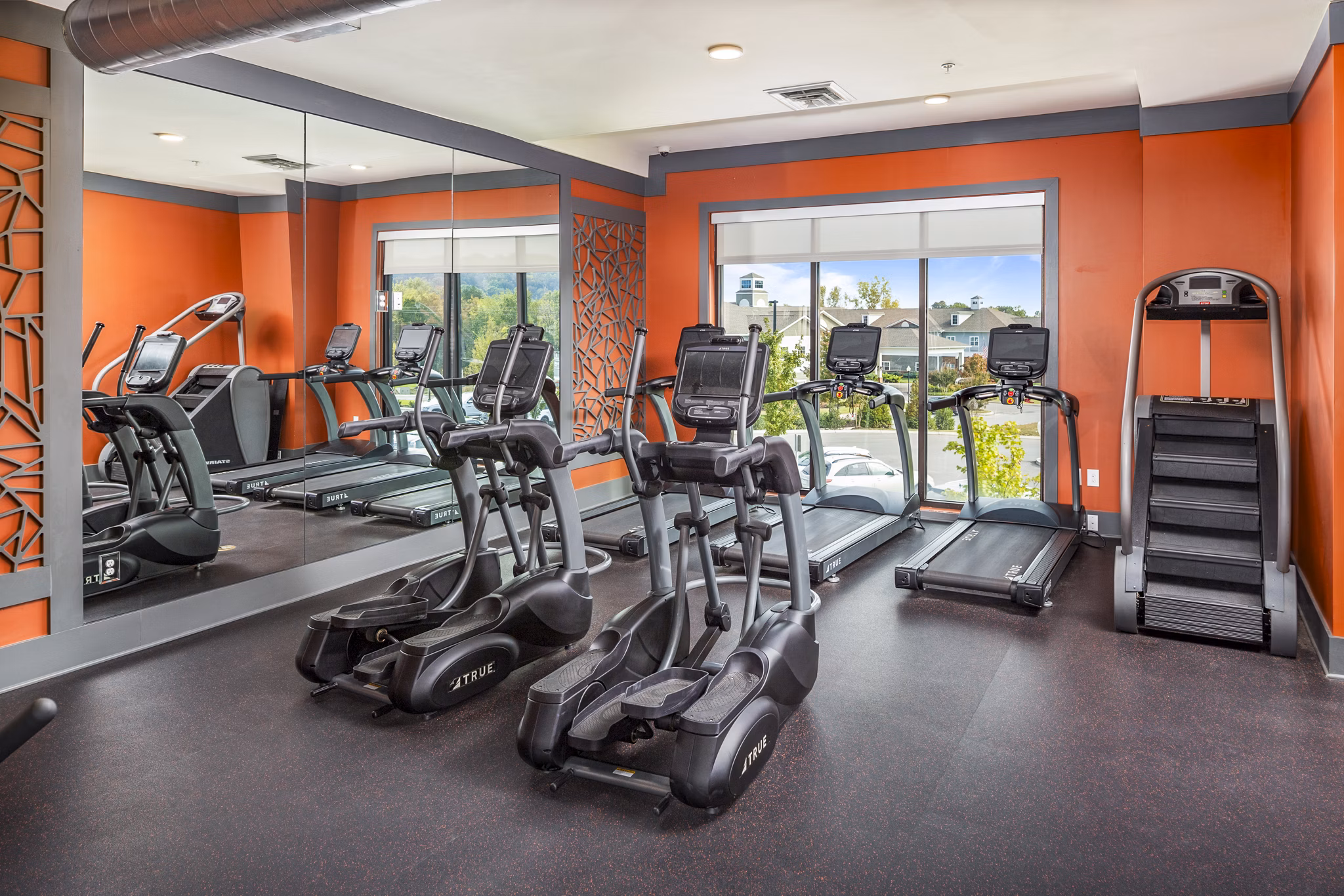 State-of-the-art fitness center at Sterling at Stonecrest Apartments offering modern gym equipment and wellness facilities