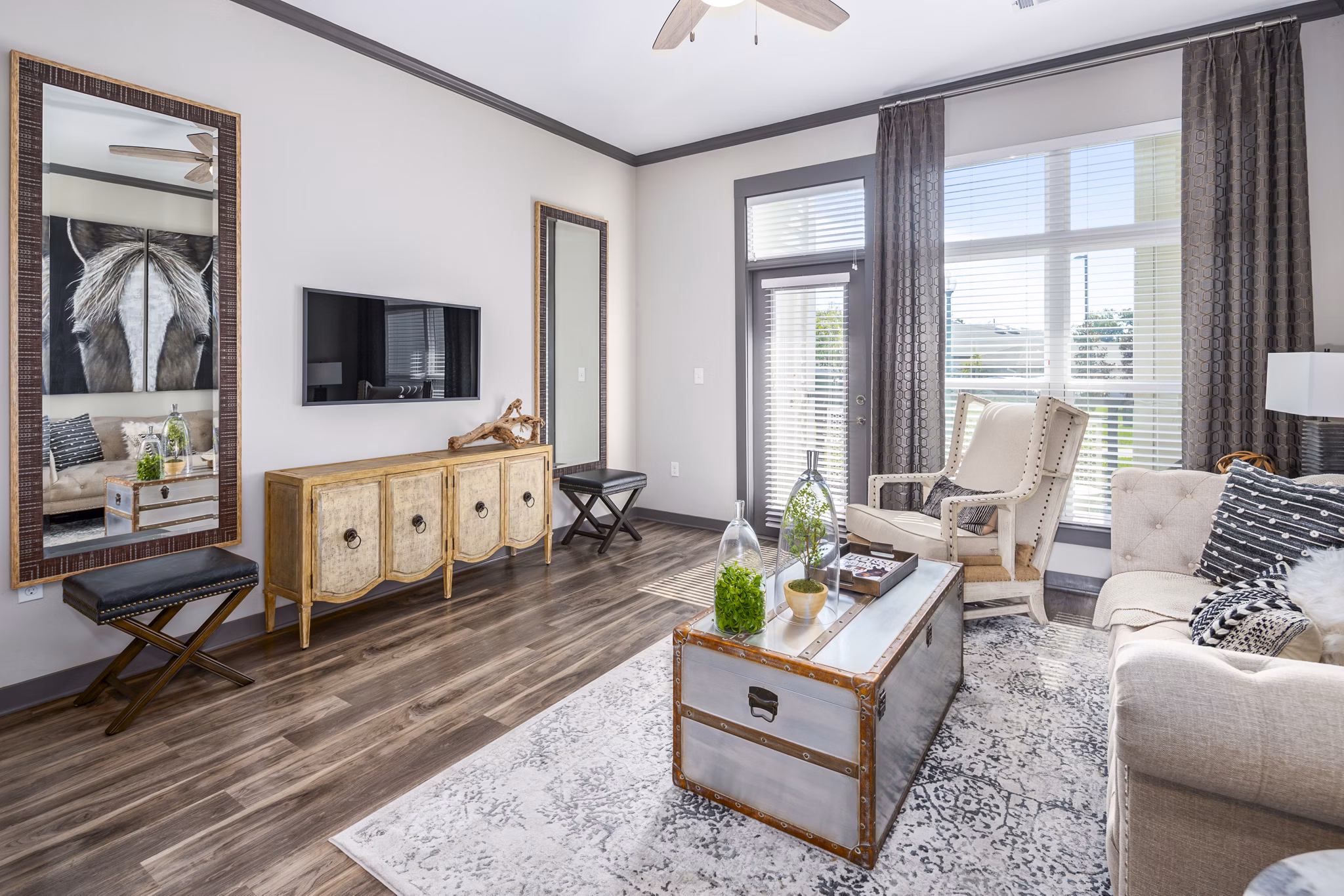 Spacious living room with modern decor in Sterling at Stonecrest Apartments