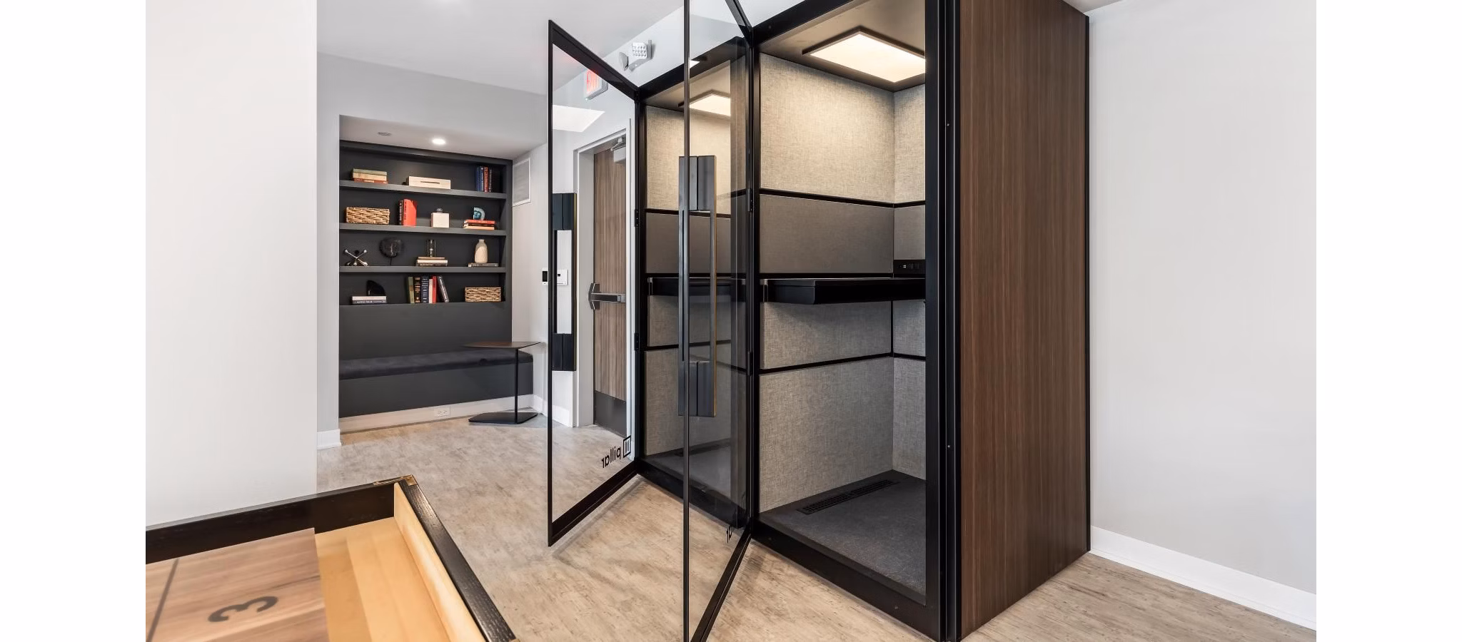 Clubhouse featuring modern design and social lounge at District 1860 Apartments, luxury community offering premium amenities