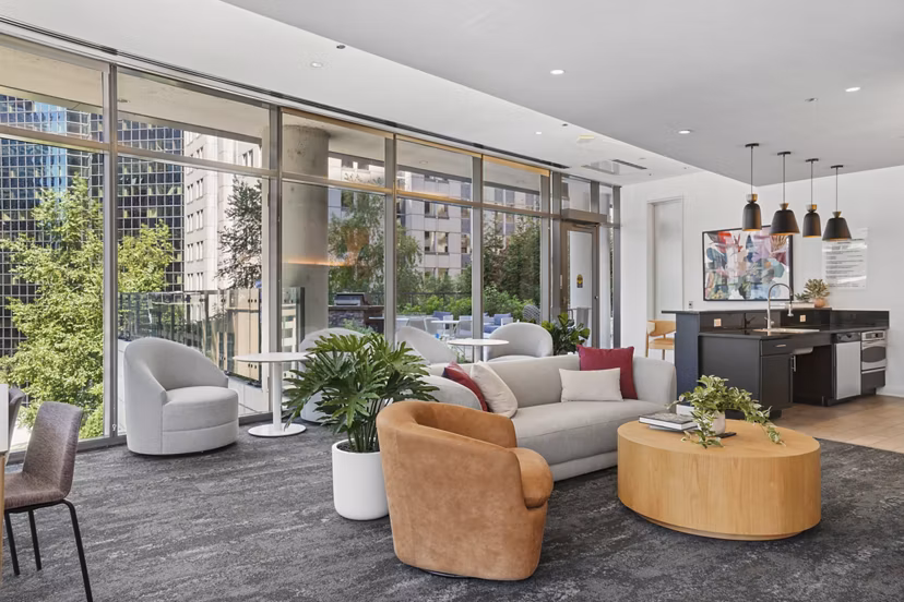 Clubhouse featuring modern design and cozy seating at Lake & Wells luxury apartments in downtown Chicago