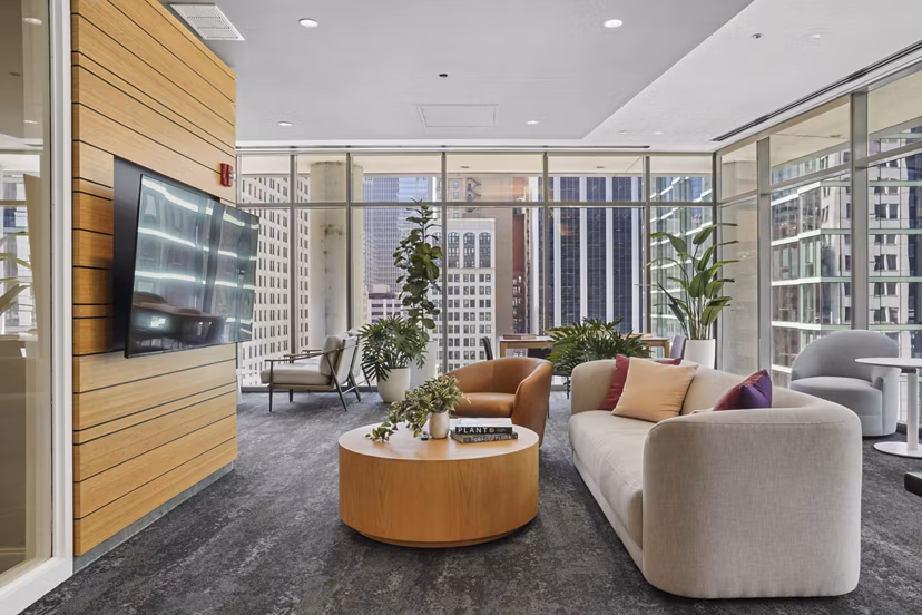 Clubhouse featuring modern design elements and social seating at Lake & Wells luxury apartments