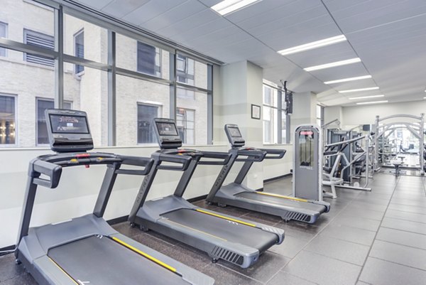 State-of-the-art fitness center with modern equipment at Lake & Wells luxury apartments