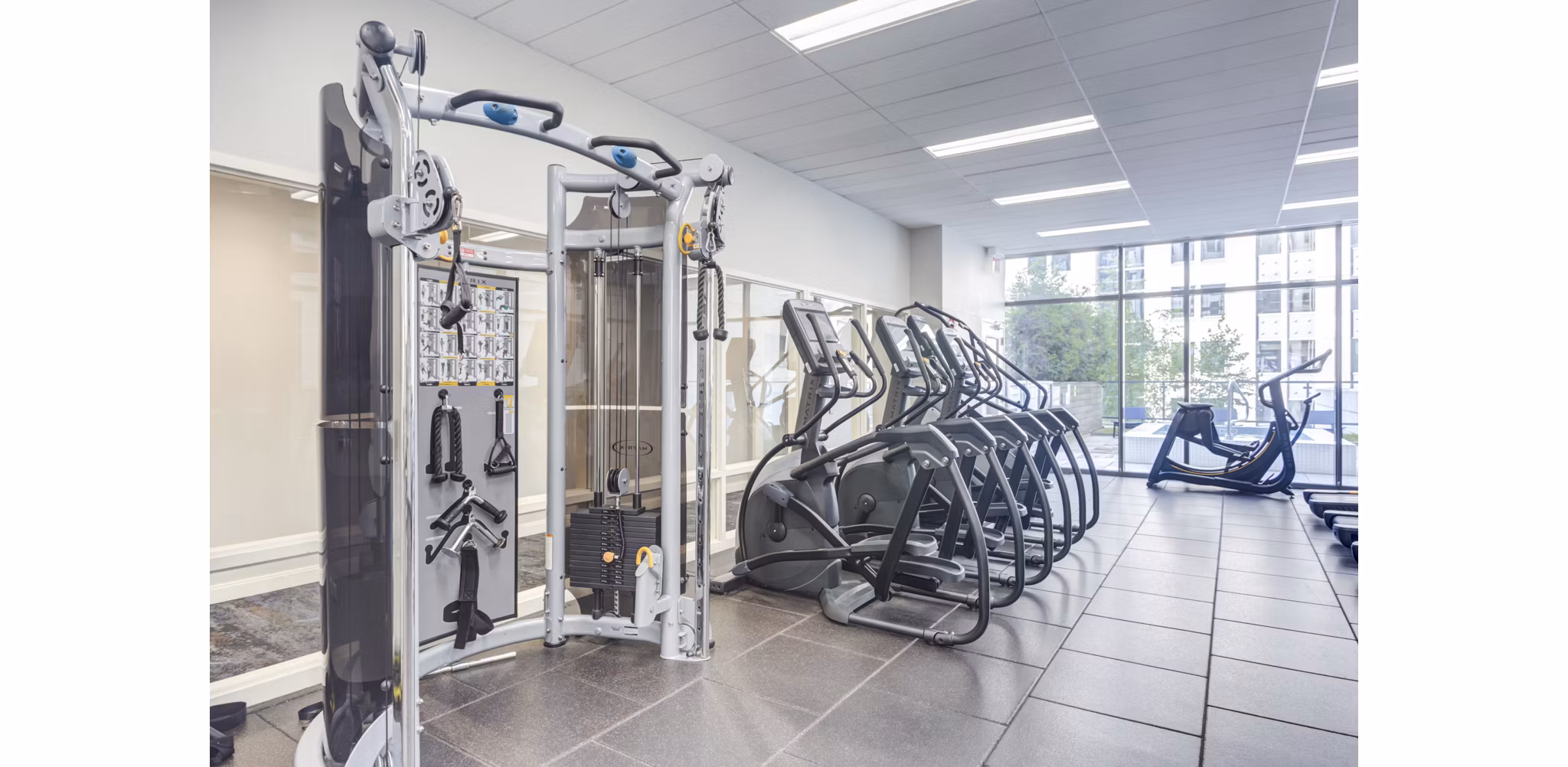 The Fitness Center at Lake & Wells features state-of-the-art equipment and a spacious layout for an exceptional workout experience