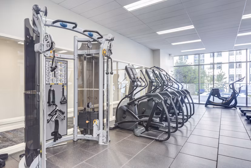 The Fitness Center at Lake & Wells features state-of-the-art equipment and a spacious layout for an exceptional workout experience