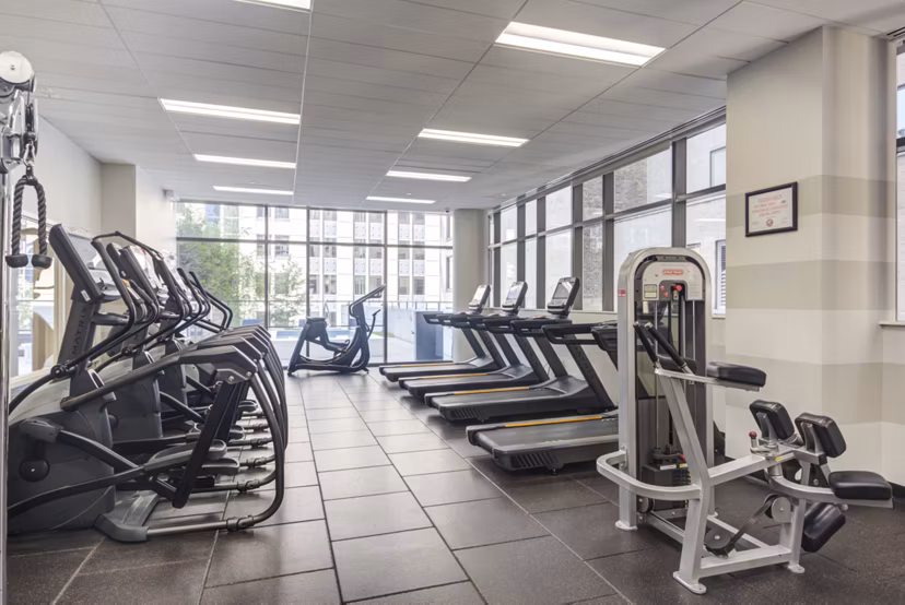 State-of-the-art fitness center with modern equipment at Lake & Wells luxury apartments