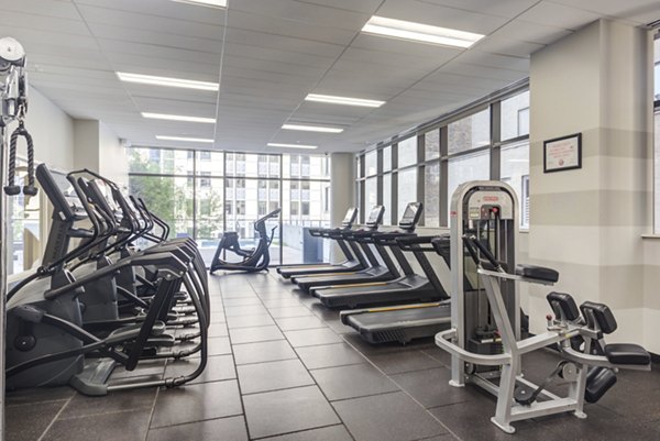State-of-the-art fitness center with modern equipment at Lake & Wells luxury apartments