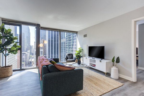 Spacious modern living room with contemporary decor in Lake & Wells luxury apartments