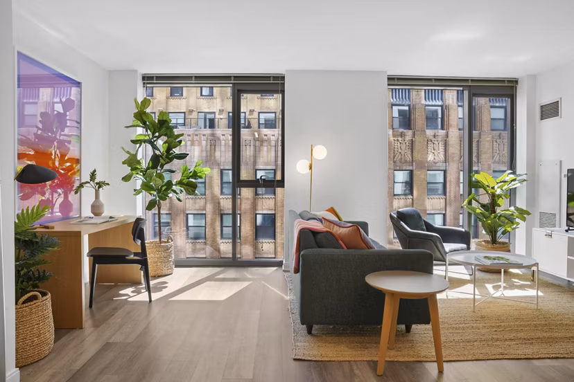 Spacious living room with modern decor in Lake & Wells apartments