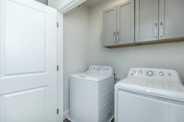 laundry room at The Oaks on Chisholm Trail Apartments