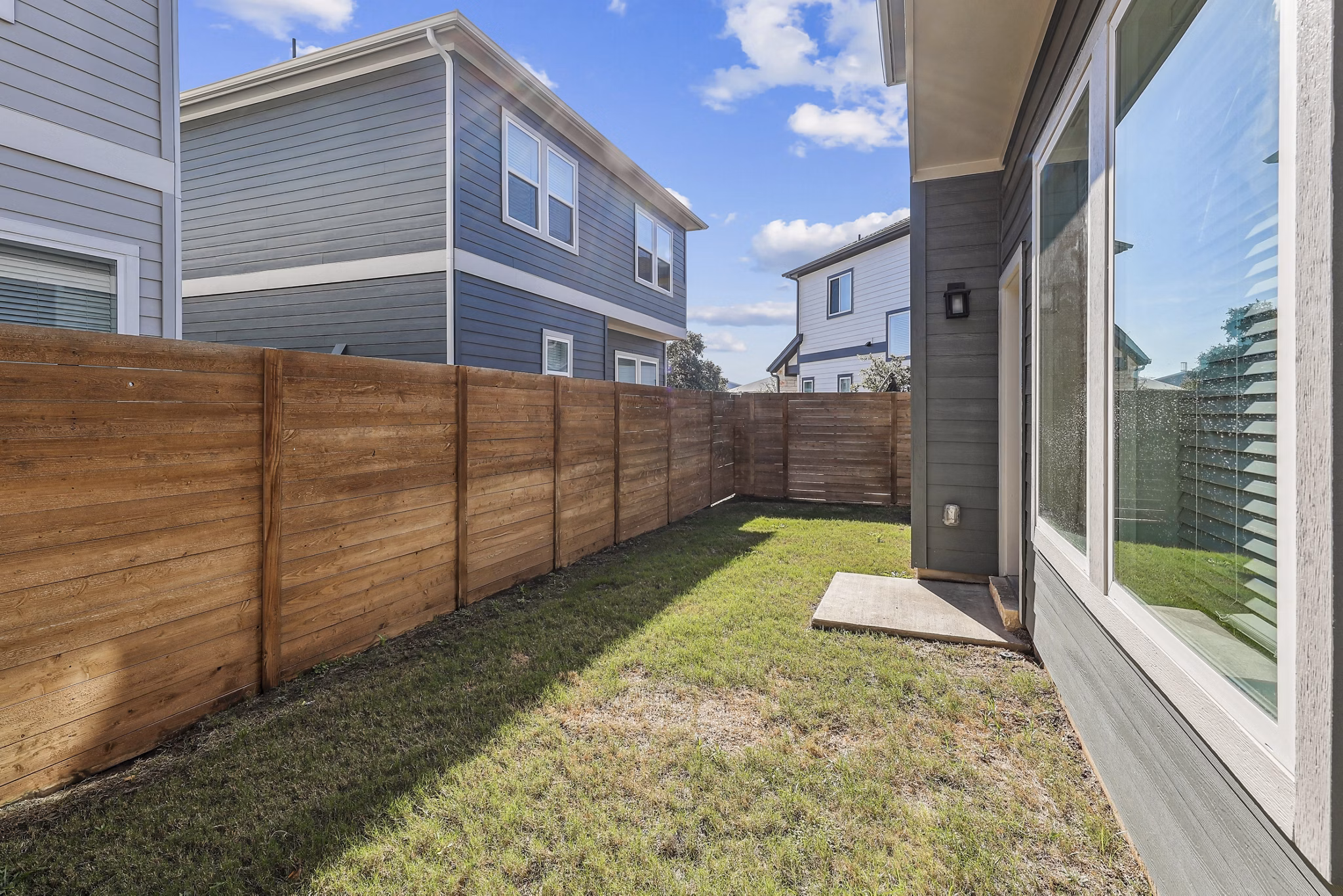 backyard/patio at The Oaks on Chisholm Trail Apartments