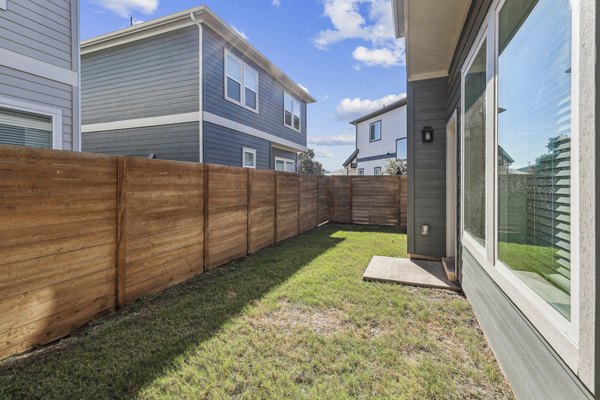 backyard/patio at The Oaks on Chisholm Trail Apartments