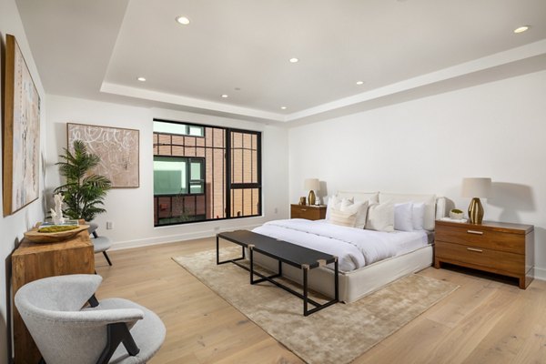Stylish bedroom with modern design at The Alfred Apartments in Greystar luxury community, perfect for comfortable living