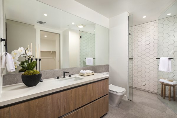 Bathroom featuring modern fixtures at The Alfred Apartments in luxury living atmosphere