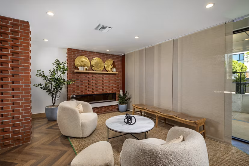 Elegant clubhouse with modern seating and stylish decor at The Alfred Apartments
