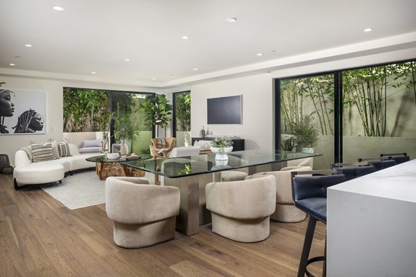 Spacious modern kitchen with stainless steel appliances in The Alfred Apartments