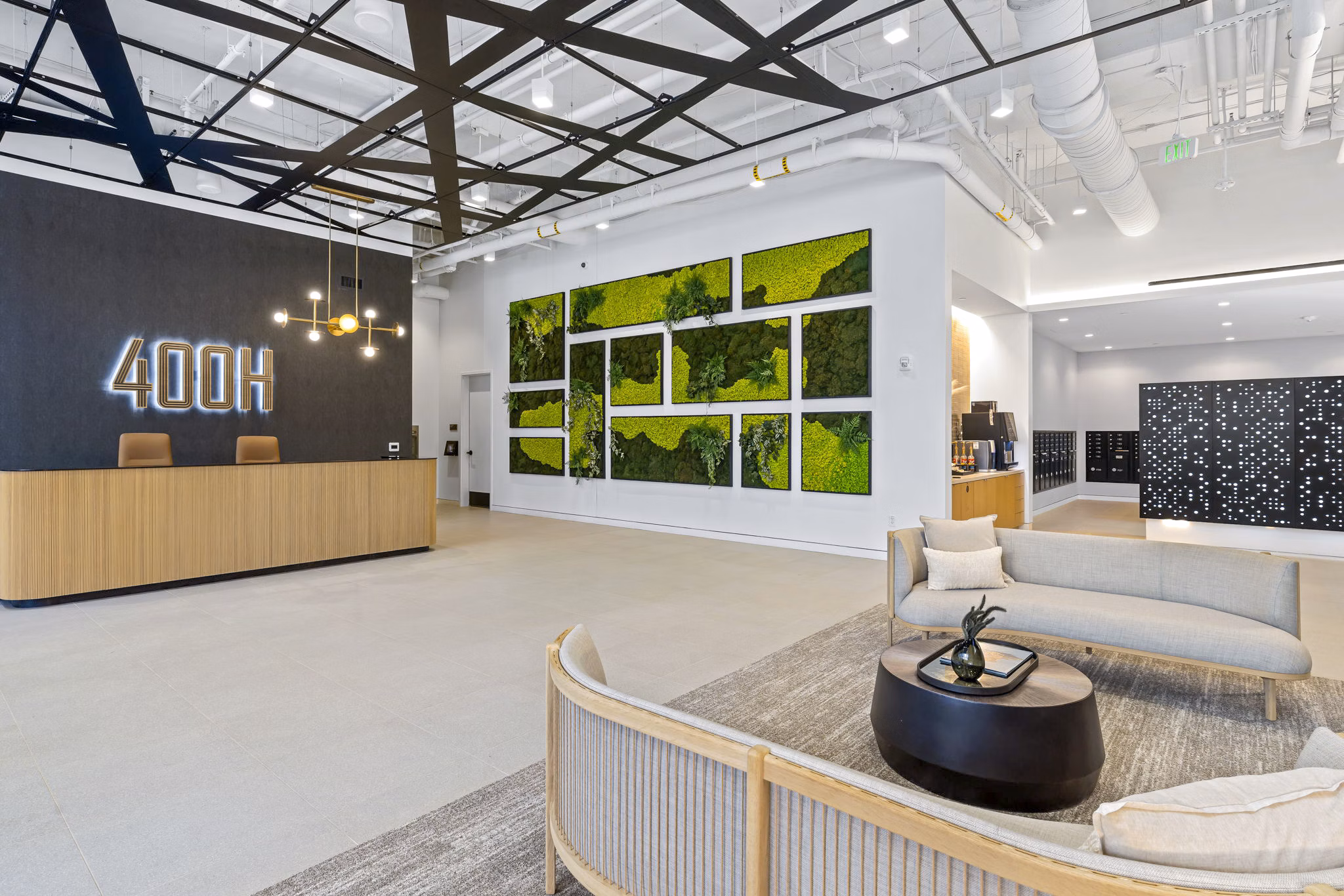 Clubhouse featuring elegant lobby design with modern furnishings at 400H Apartments