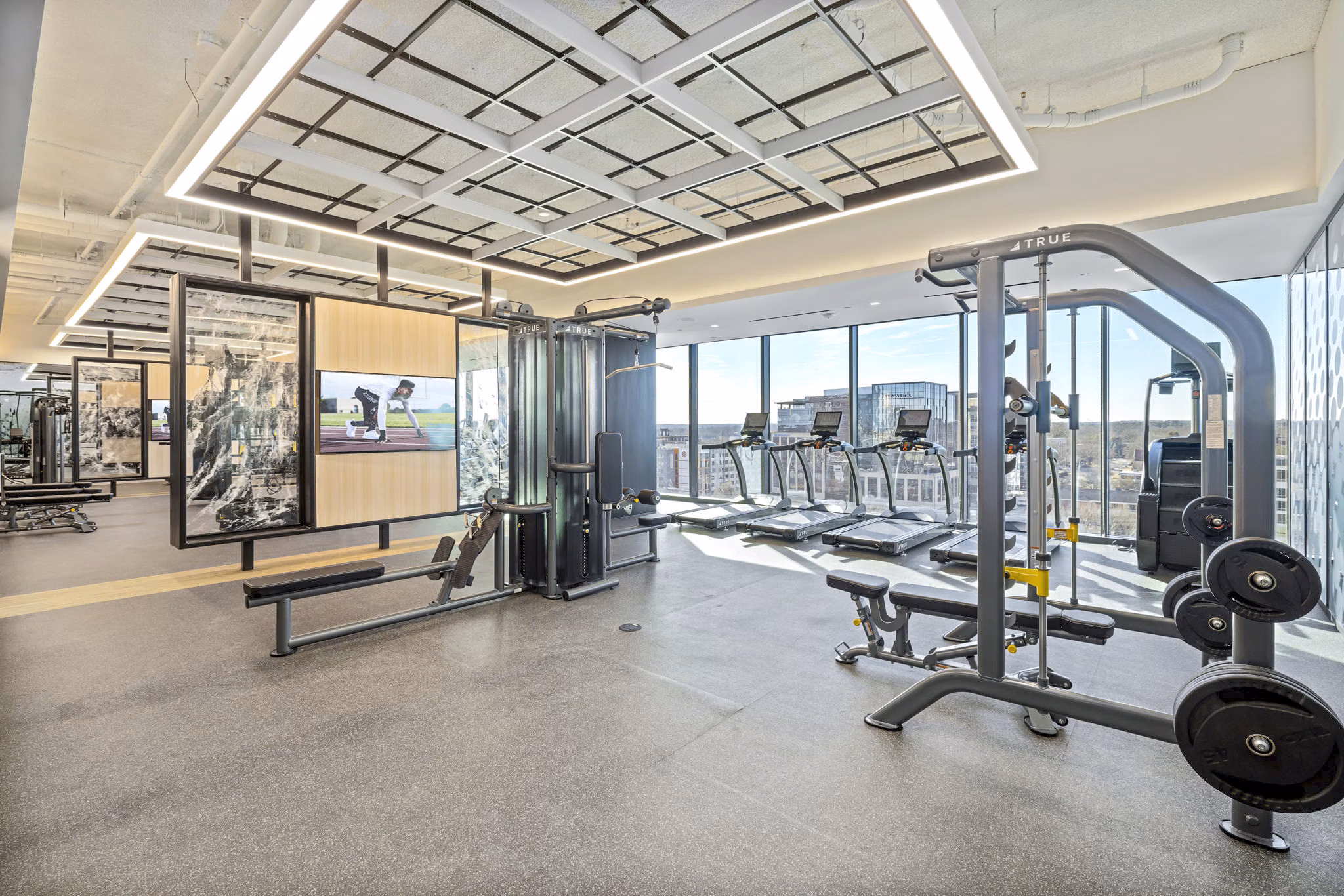 Fitness center with state-of-the-art equipment at 400H Apartments, a Greystar luxury property in downtown Raleigh