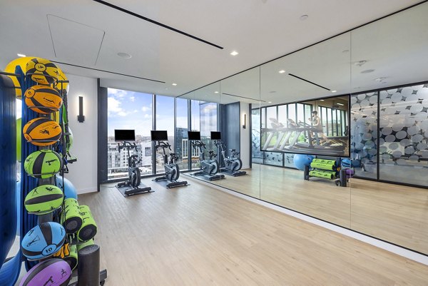 Modern yoga-spin studio featuring state-of-the-art equipment at 400H Apartments