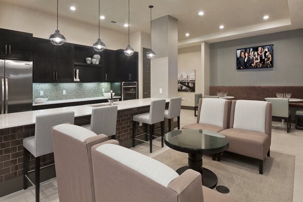 Elegant clubhouse featuring modern decor at Echo Apartments, ideal for social gatherings and events