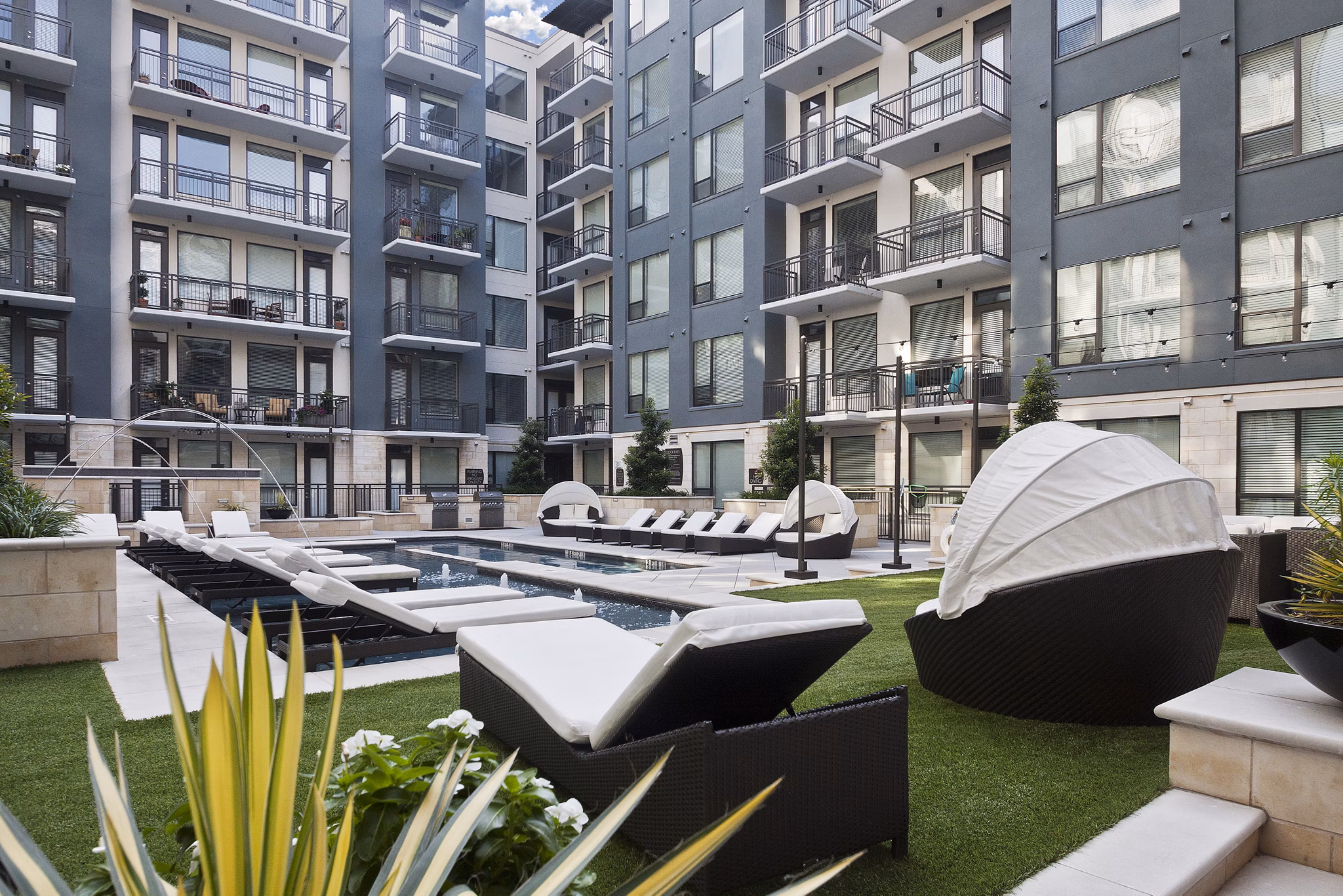 Courtyard view with lush greenery at Echo Apartments