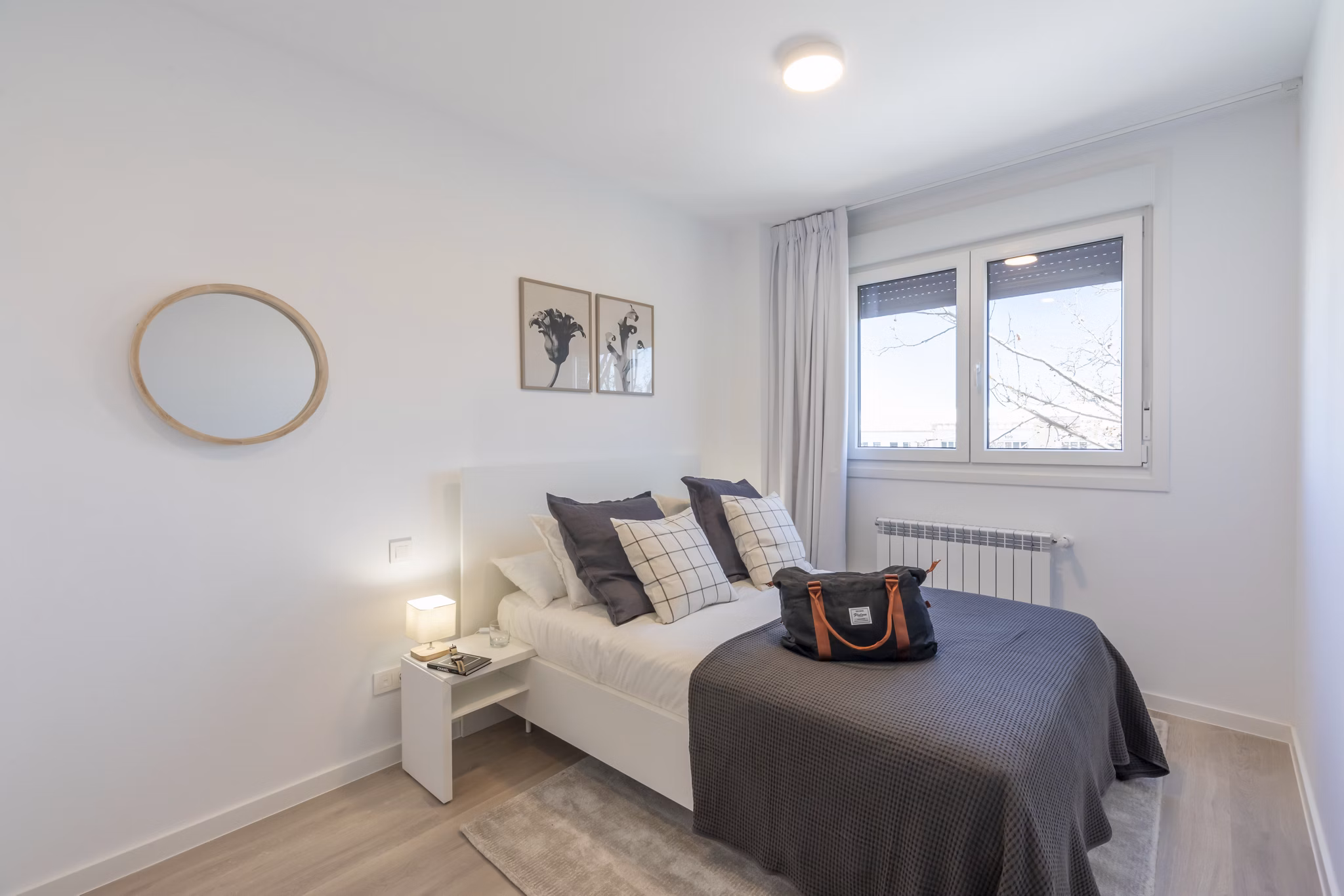 Beautifully designed bedroom with a relaxing ambiance at Be Casa Essential Barajas.