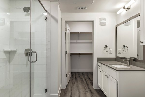 Modern bathroom with sleek fixtures at Crosstown Apartments