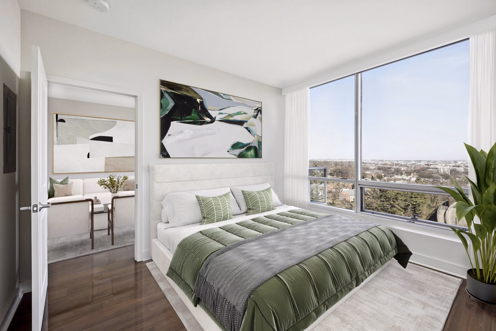 Cozy bedroom with contemporary design and large windows at Verde Pointe