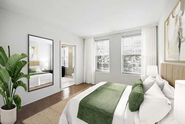 Cozy bedroom with modern decor at Verde Pointe luxury apartments