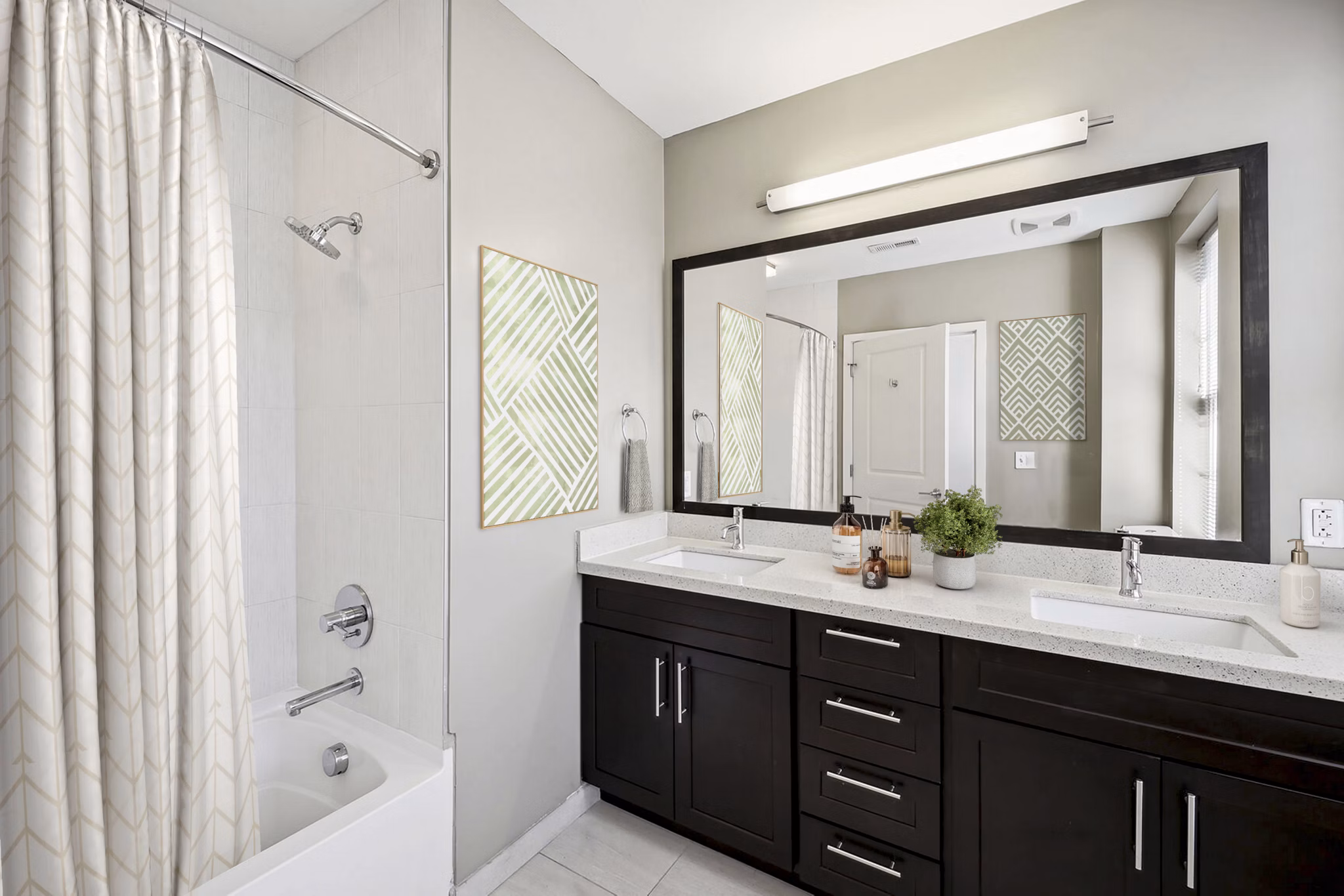 Elegant bathroom featuring marble countertops and modern fixtures at Verde Pointe apartments