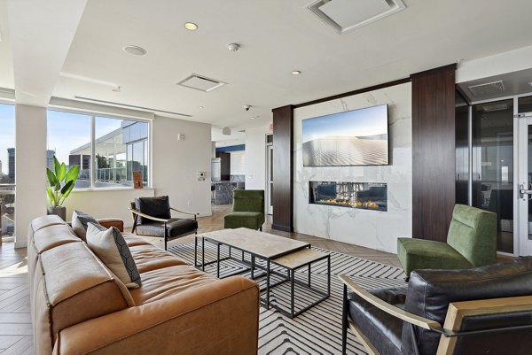 Clubhouse at Verde Pointe: Modern clubhouse with stylish decor and ample seating, perfect for resident gatherings at luxury apartments