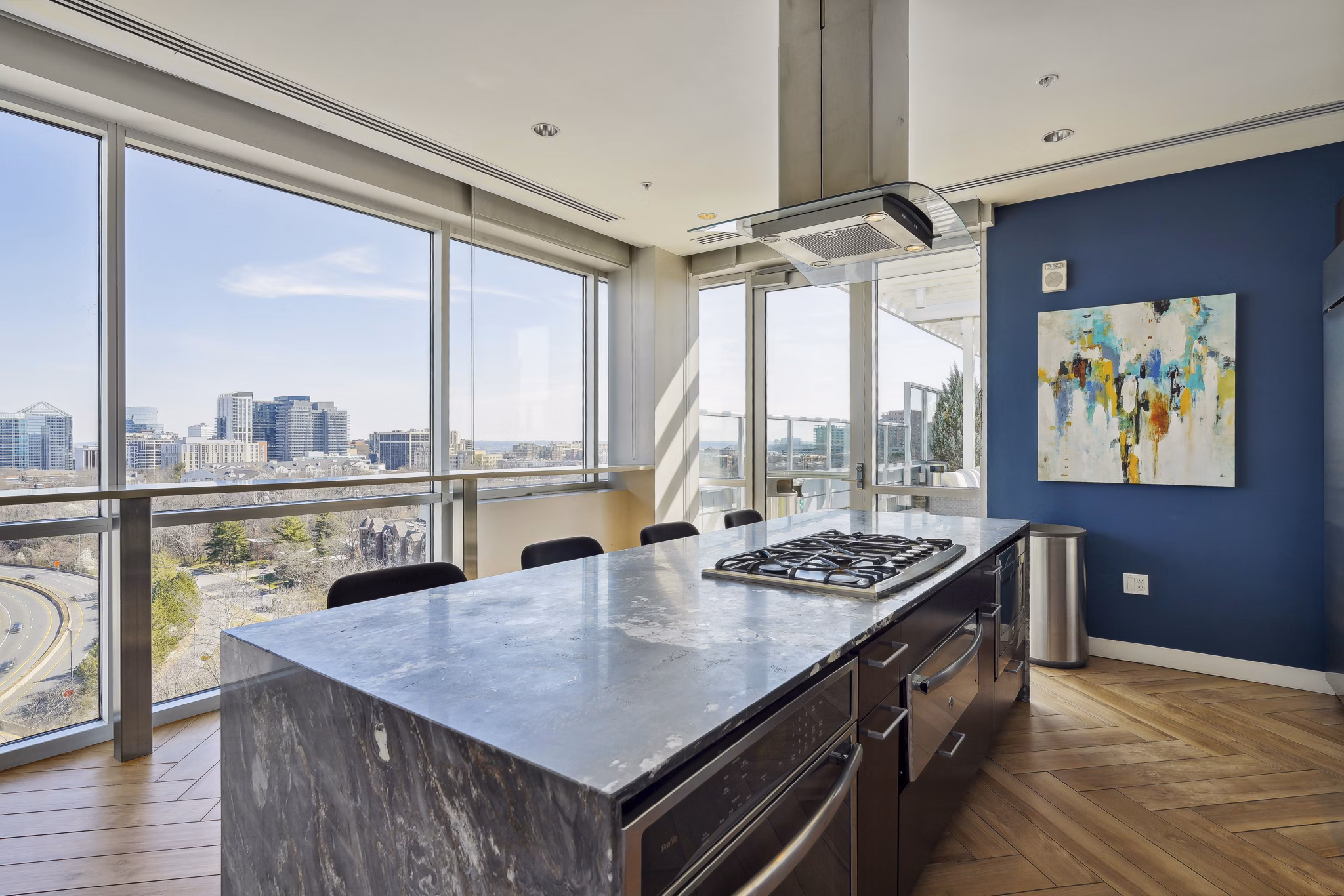 Clubhouse featuring modern design and spacious seating at Verde Pointe apartments, Arlington