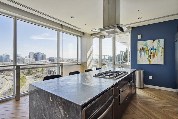 Clubhouse featuring modern design and spacious seating at Verde Pointe apartments, Arlington