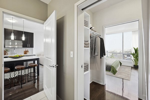 Hallway featuring contemporary lighting and sleek flooring at Verde Pointe luxury apartments