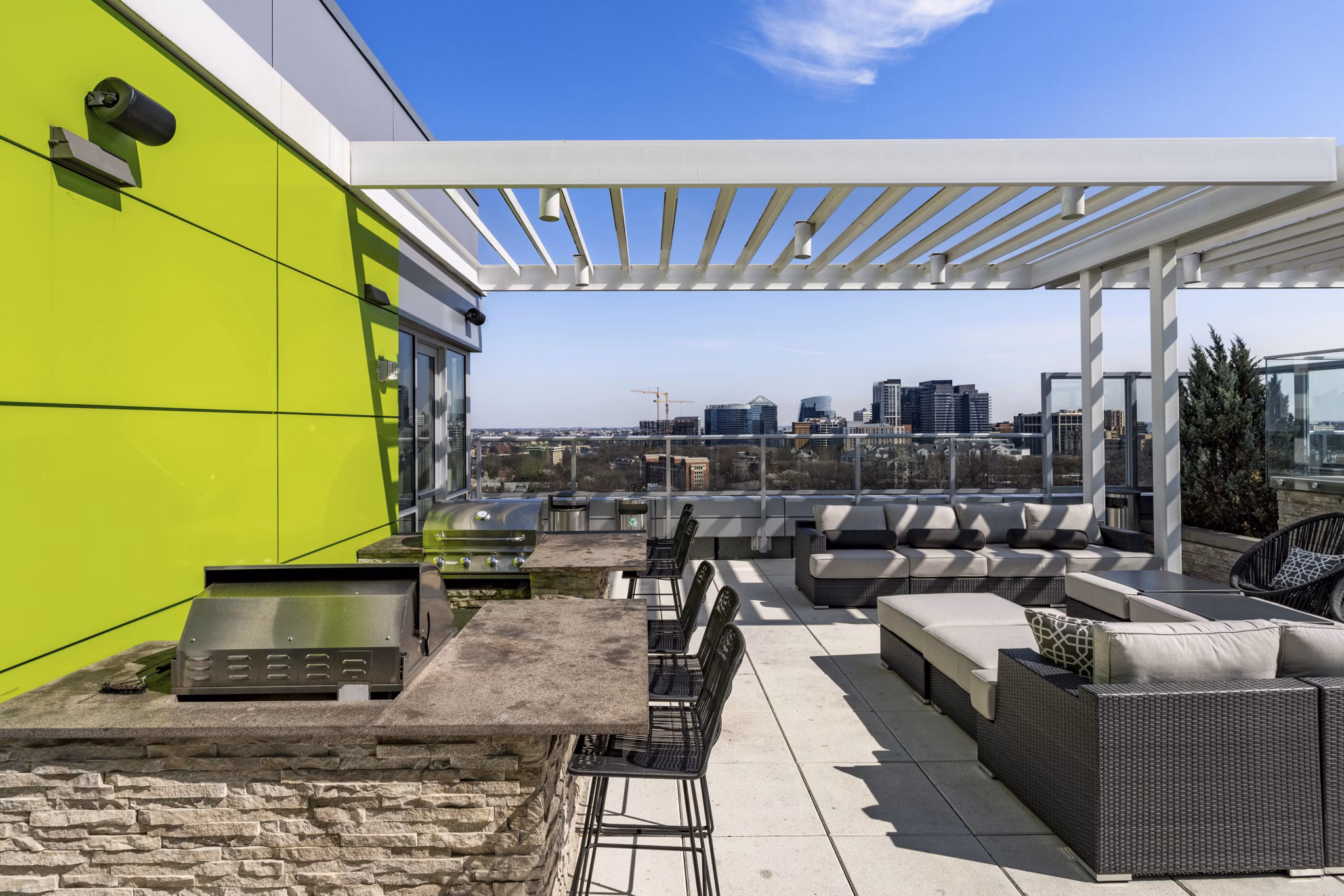 Grill area with modern barbecue stations at Verde Pointe apartments