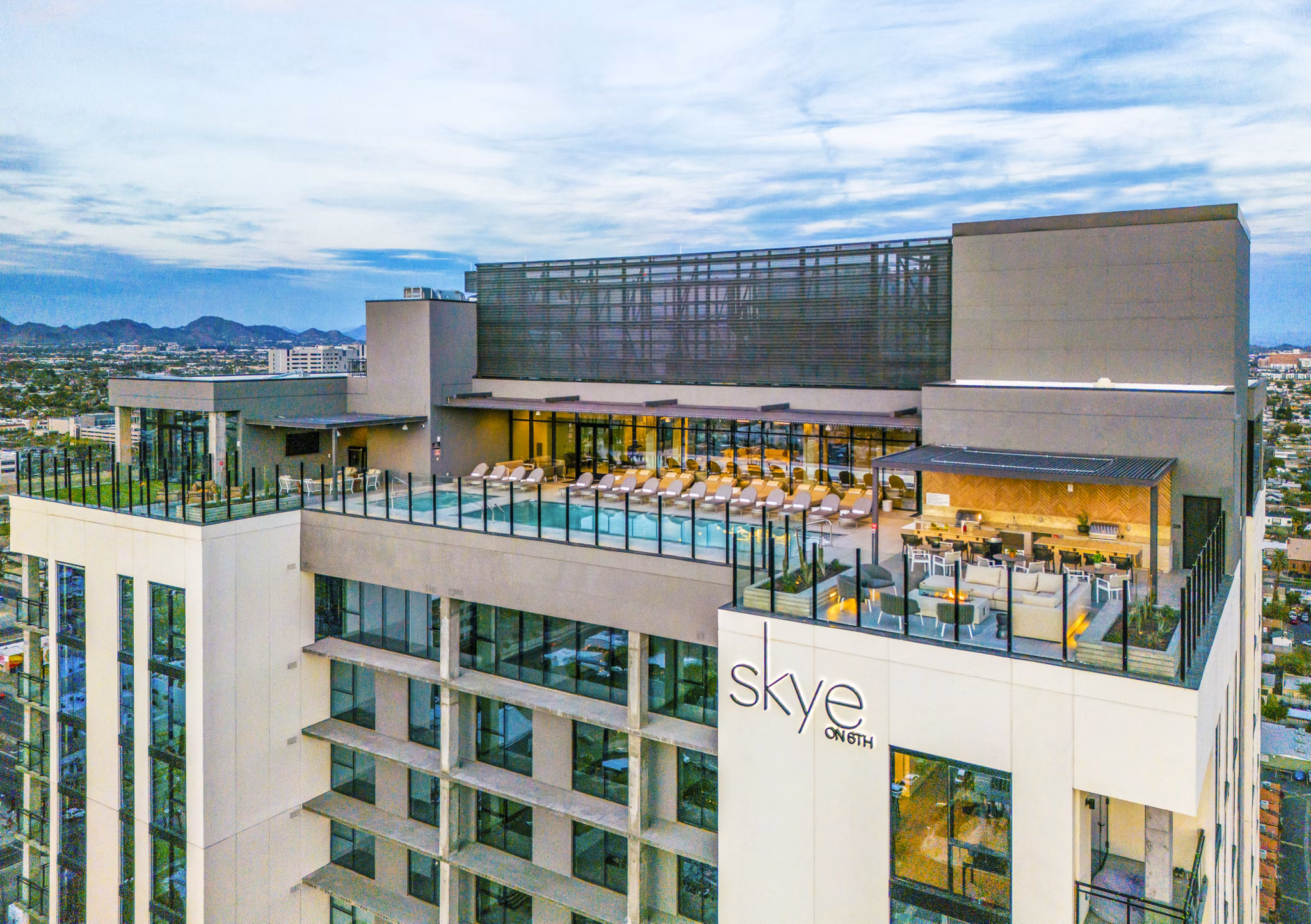 Skye on 6th Apartments: Contemporary high-rise building in the vibrant heart of the city, showcasing luxury urban living