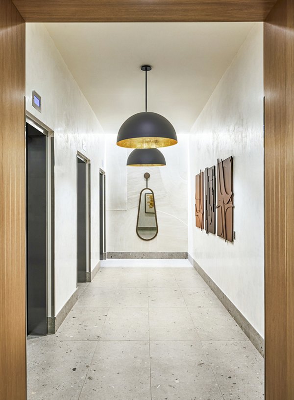 Resident elevator at Skye on 6th Apartments with modern design and spacious interior, enhancing luxury living experience in city center