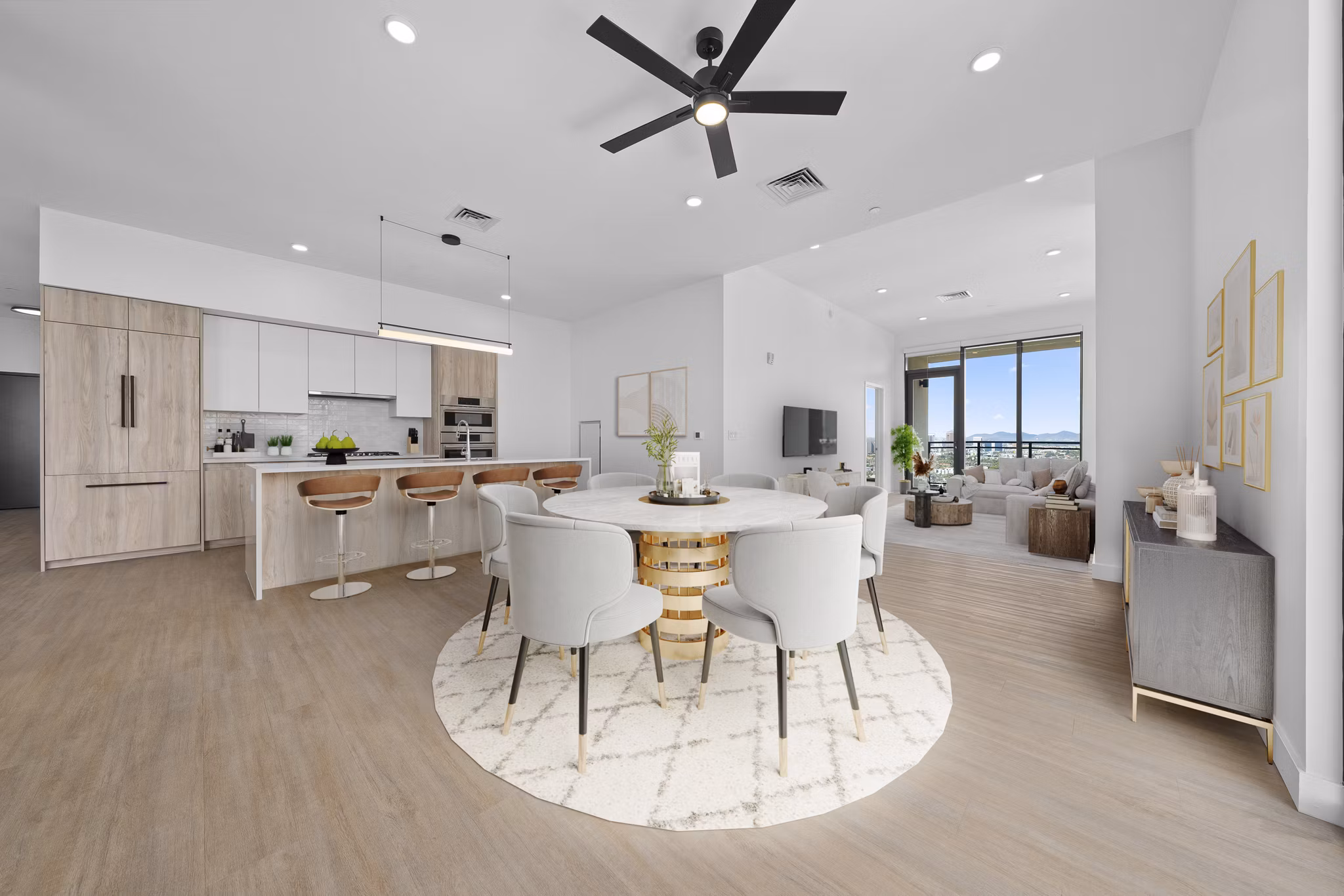 Dining area featuring modern decor and seating at Skye on 6th Apartments