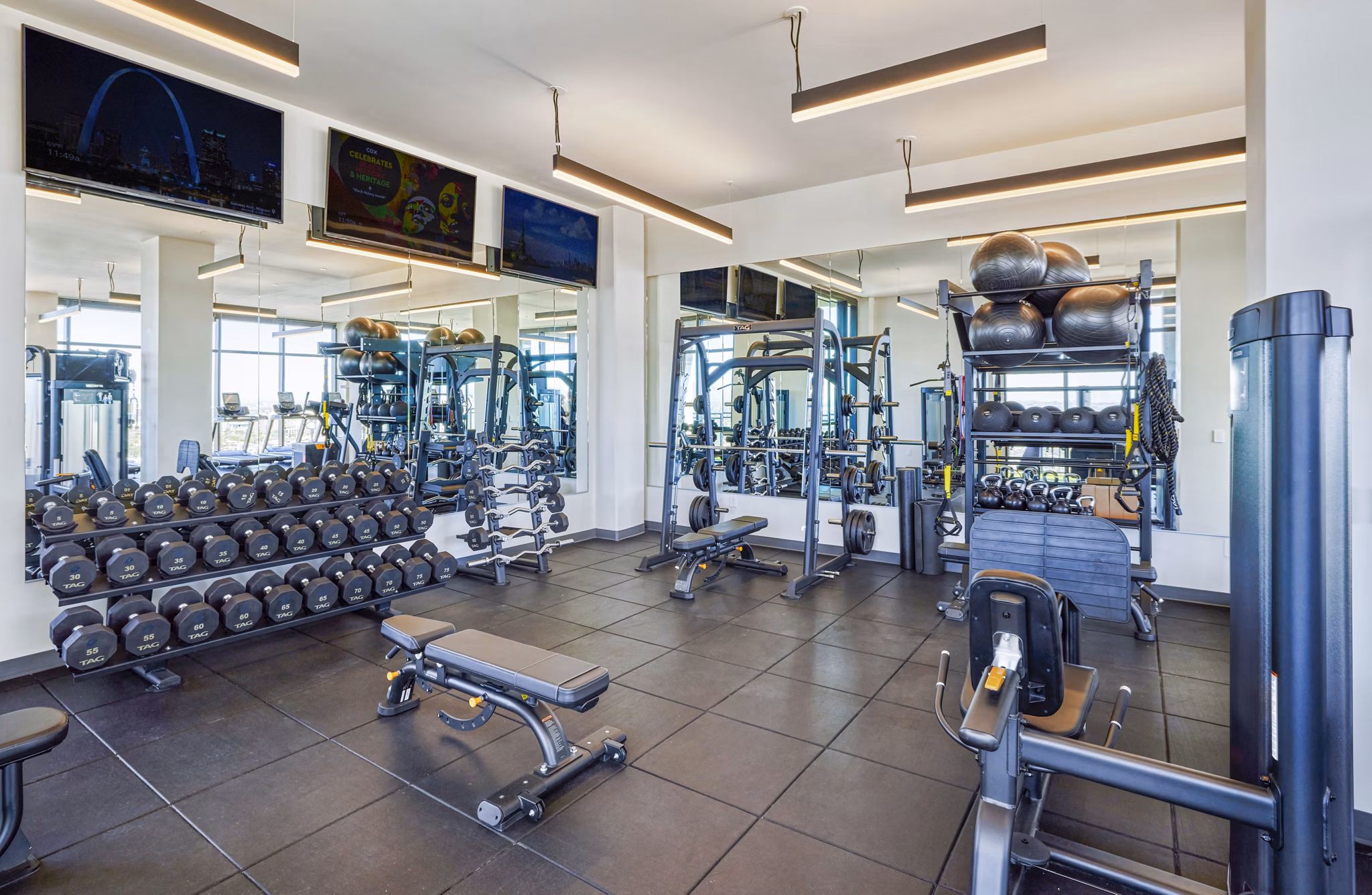 Modern fitness center with cutting-edge equipment at Skye on 6th Apartments, offering residents a premium workout experience