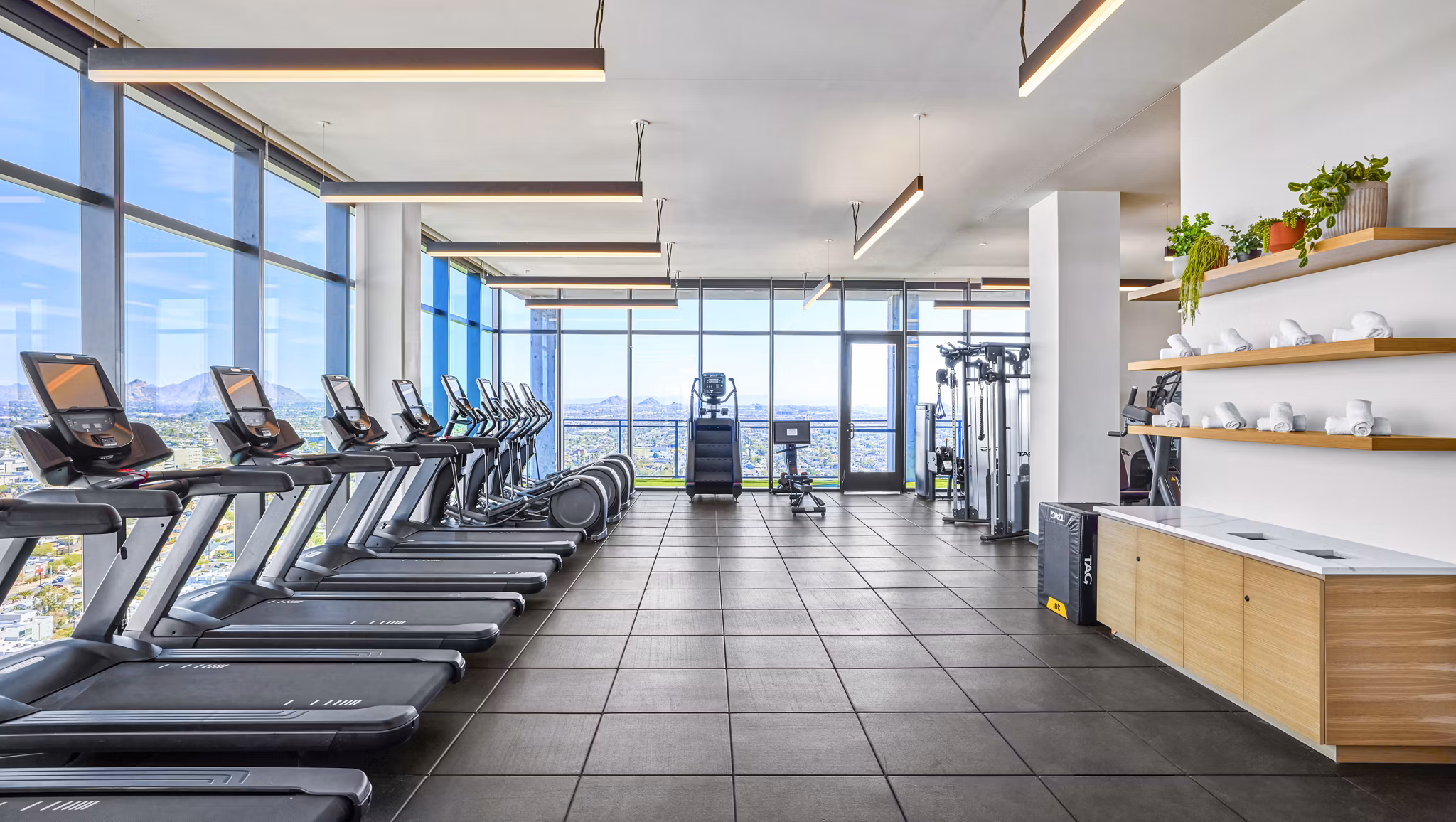 Fitness center with modern equipment at Skye on 6th Apartments