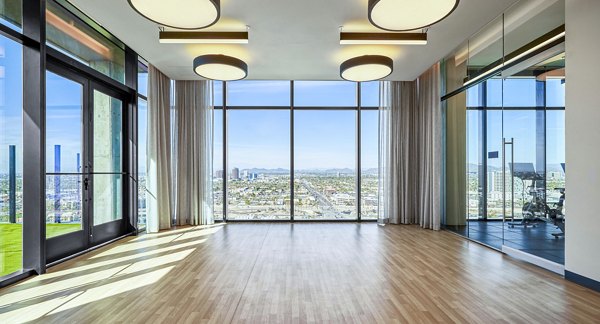 Modern yoga studio with natural light at Skye on 6th Apartments in luxury Greystar community