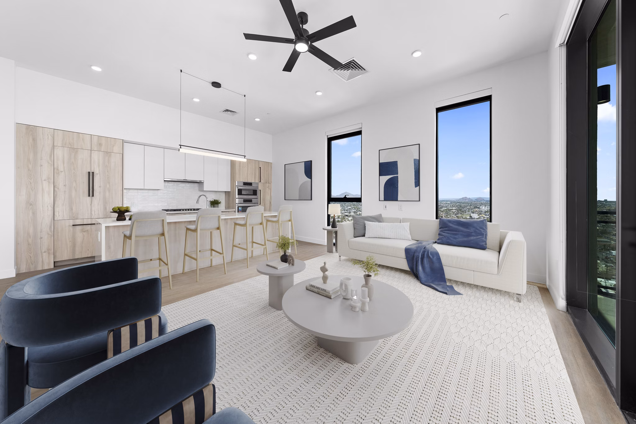 Spacious living room with modern decor and city views in Skye on 6th Apartments, luxury living in the heart of the city