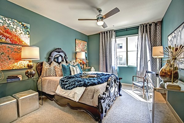 Modern bedroom with elegant furnishings in Constellation Apartments