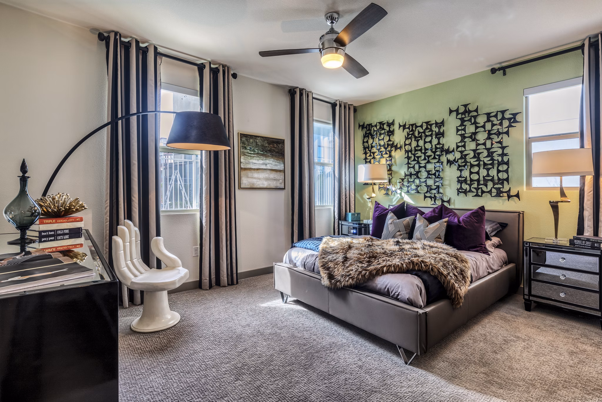 Bedroom featuring modern decor and ample natural light at Constellation Apartments
