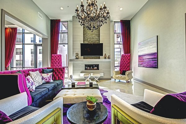 Luxurious clubhouse with modern furnishings at Constellation Apartments, offering residents a stylish space for relaxation and social gatherings