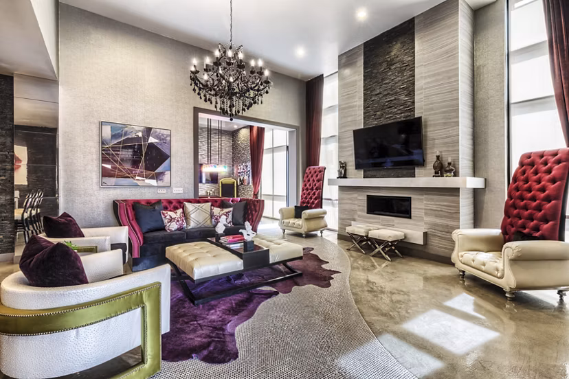 Clubhouse with modern lounge seating and entertainment zones at Constellation Apartments, luxury living by Greystar