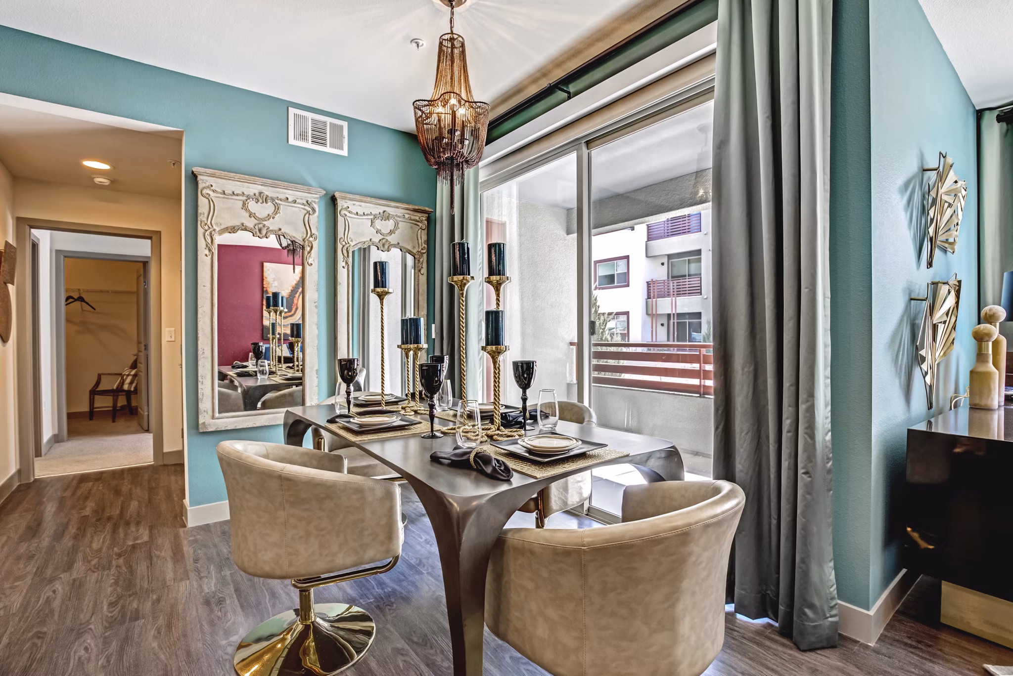 Dining area with modern furnishings and elegant lighting at Constellation Apartments, a Greystar luxury apartment community