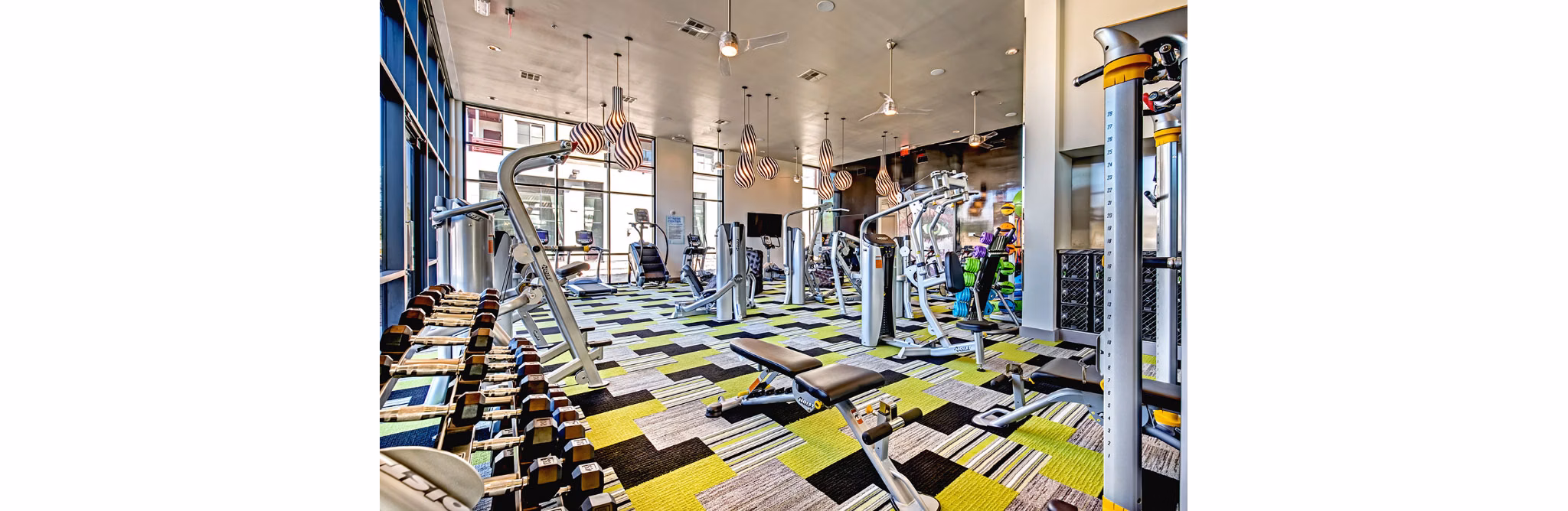 State-of-the-art fitness center with modern equipment at Constellation Apartments, offering luxury living experiences