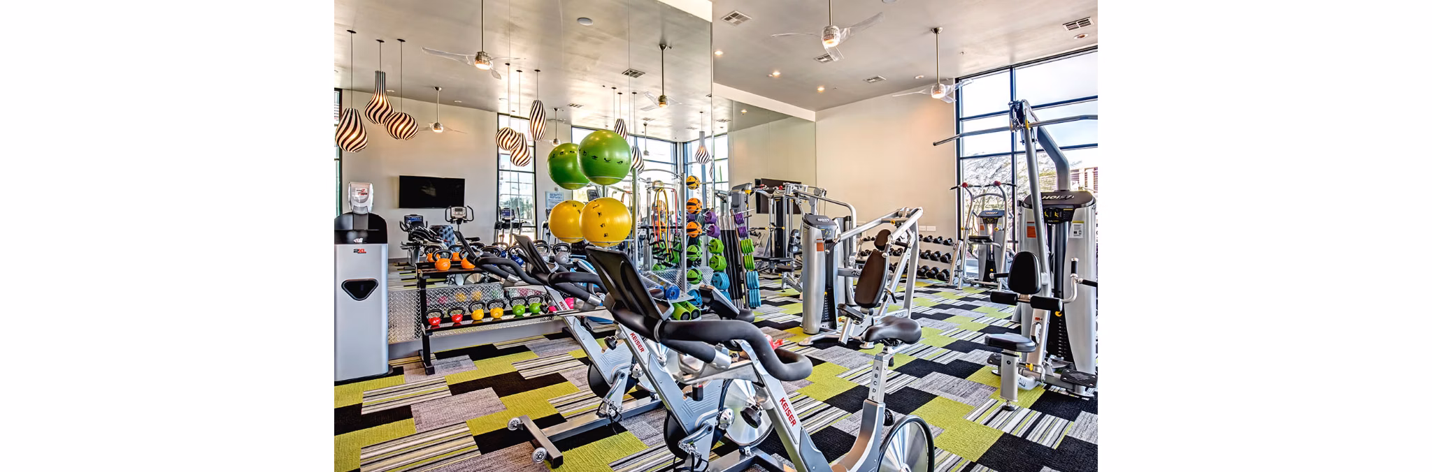 State-of-the-art fitness center at Constellation Apartments featuring modern equipment and spacious workout areas
