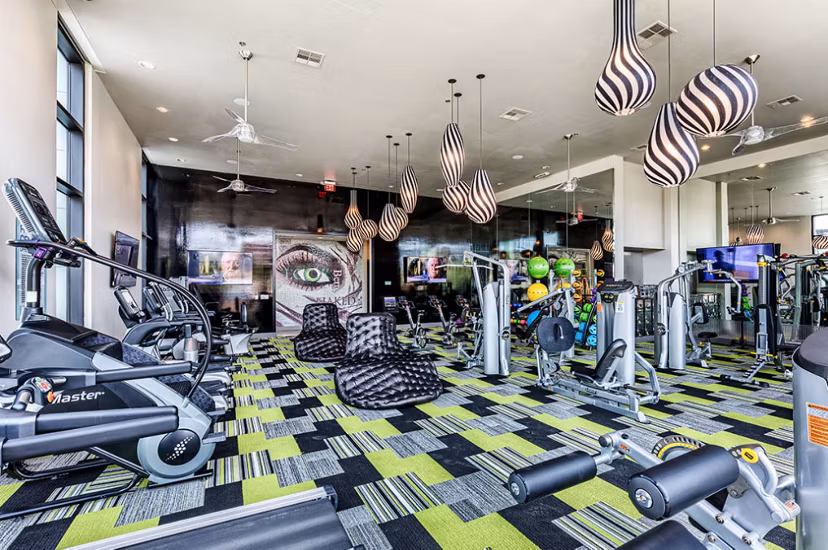 Fitness center featuring modern equipment at Constellation Apartments