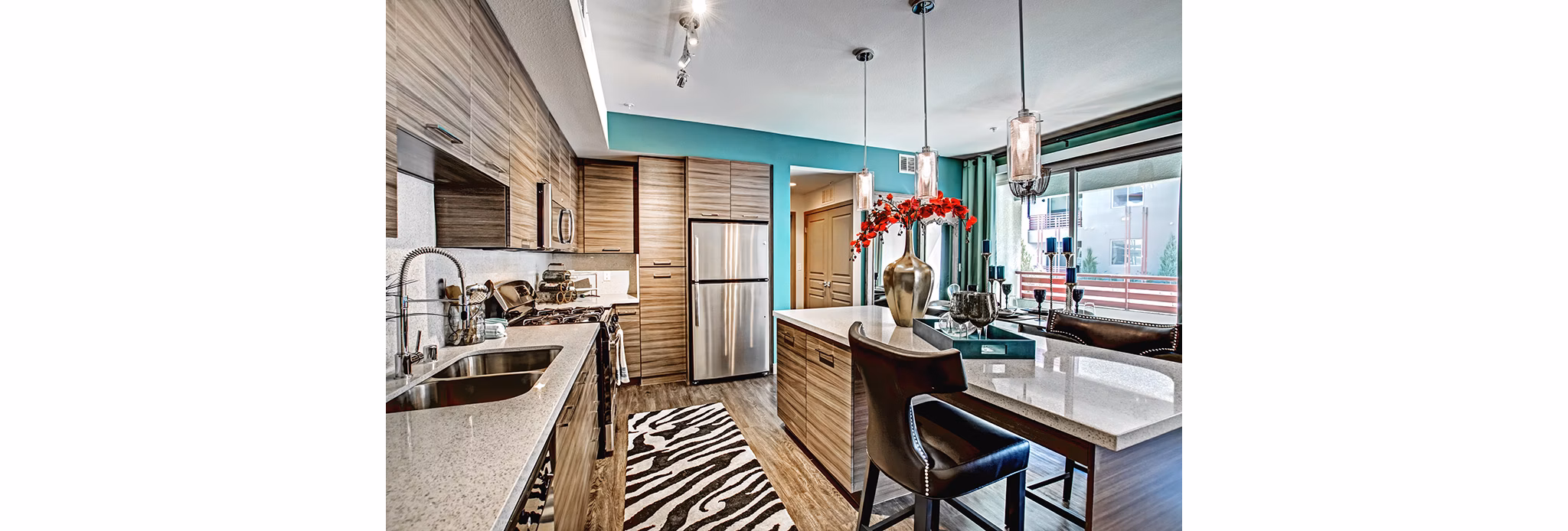 Stylish kitchen with modern appliances in Constellation Apartments